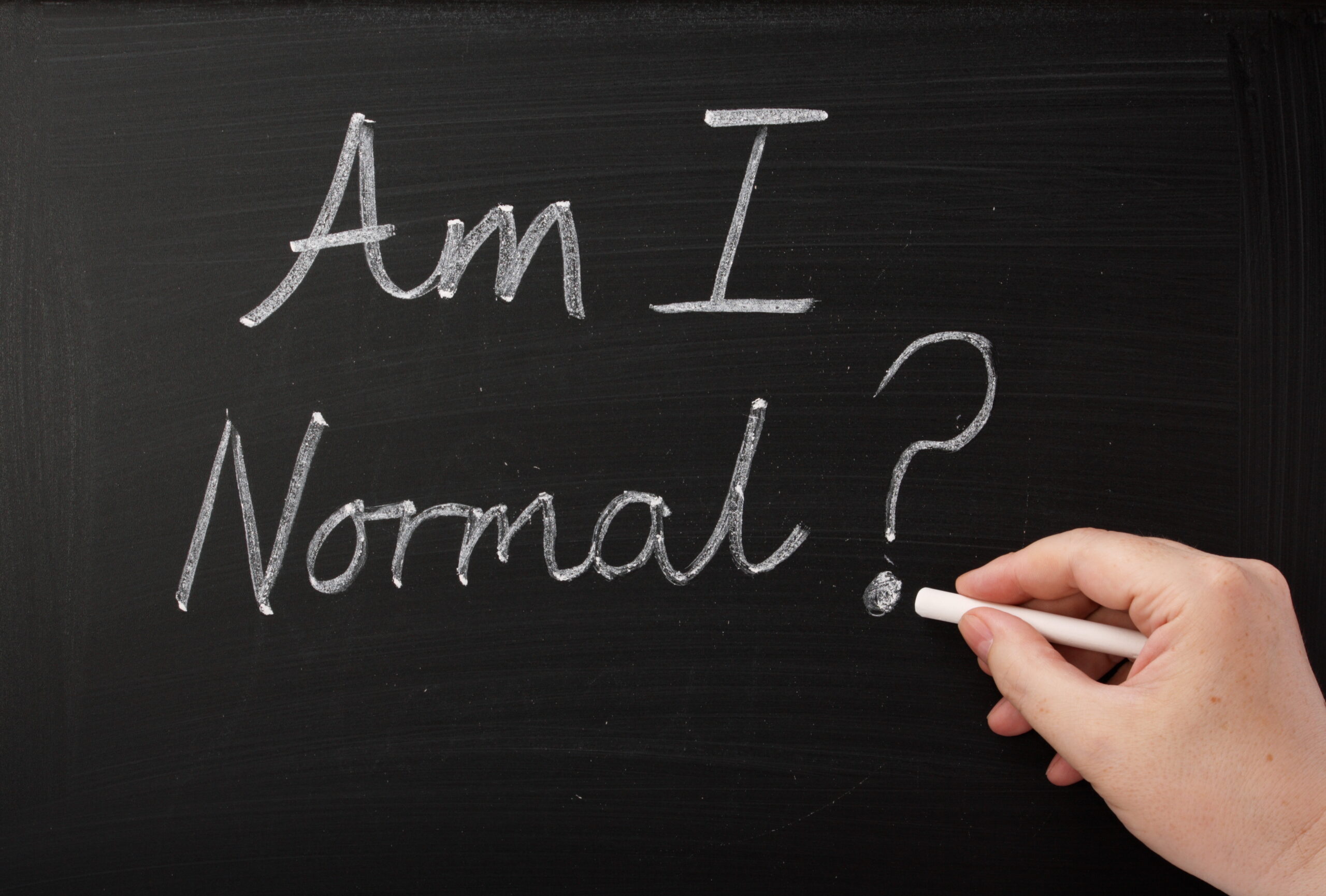 Woman questioning am I normal, a common worry addressed in mental health counseling